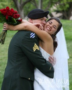 joyous bride and groom in army uniform