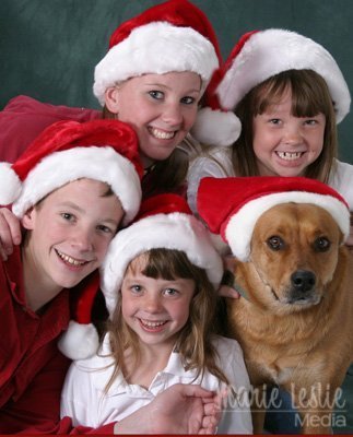 children and dog christmas portrait