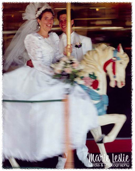 panning a bride and groom on a carousel