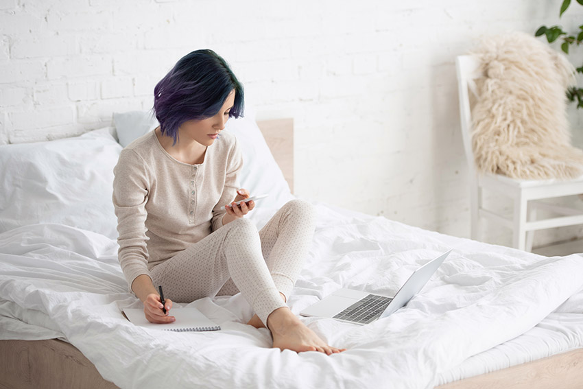 woman-working-from-home-in-her-pajamas-DP