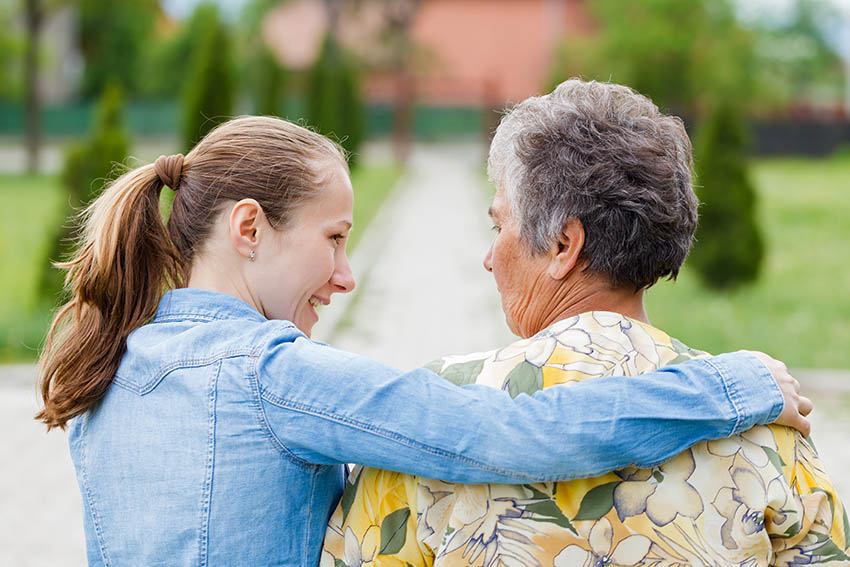 young woman seeking complete success by spending time with an older family member