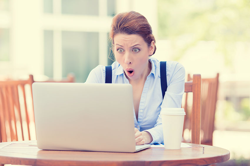 woman overwhelmed by her email inbox